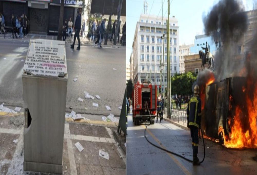 Κουκουλοφόροι έκαψαν όχημα μπροστά από την παλιά Βουλή και βεβήλωσαν το μνημείο της Marfin (ΦΩΤΟ)